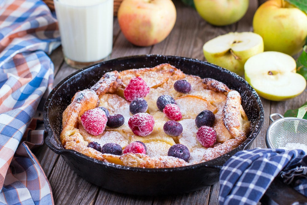 a dutch baby in a cast iron dutch oven breakfast meal