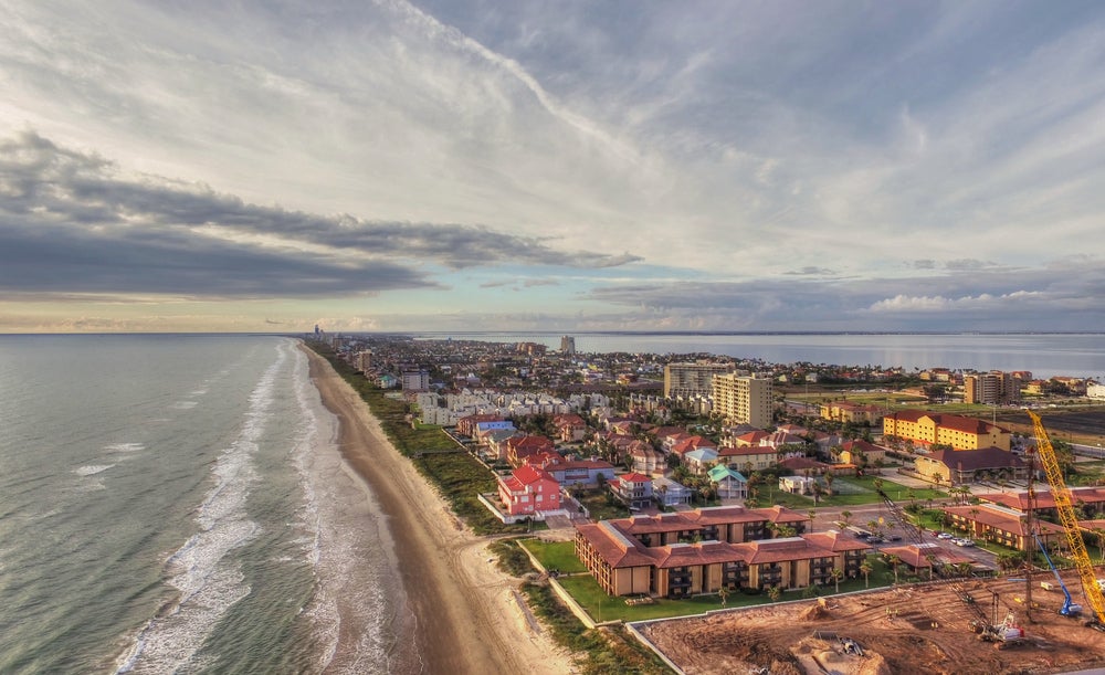 a drone footage image of South Padre Island beach in texas