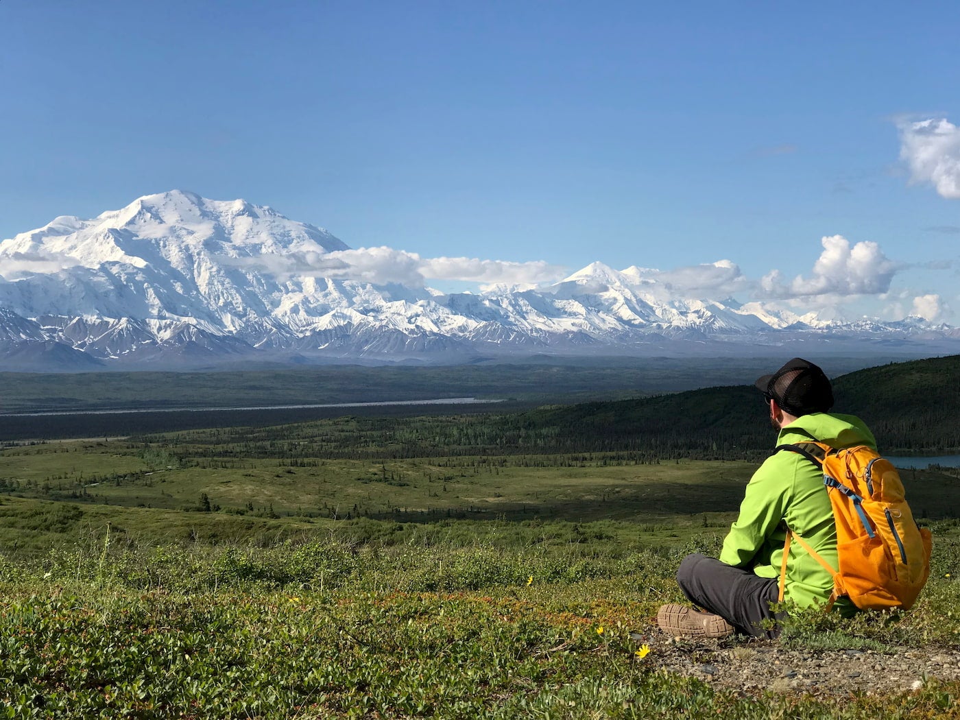 Hiker sitting in the Denali backcountry.