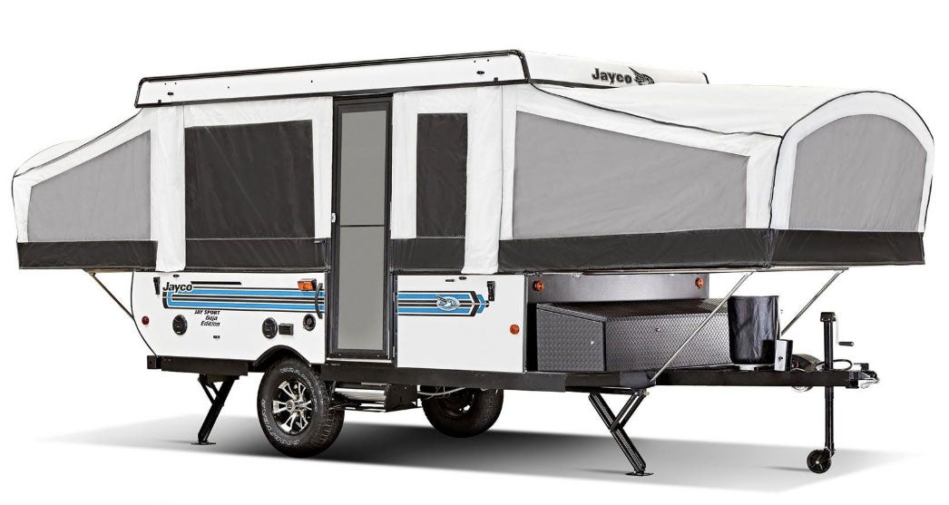 Pop up hard outlet top camper