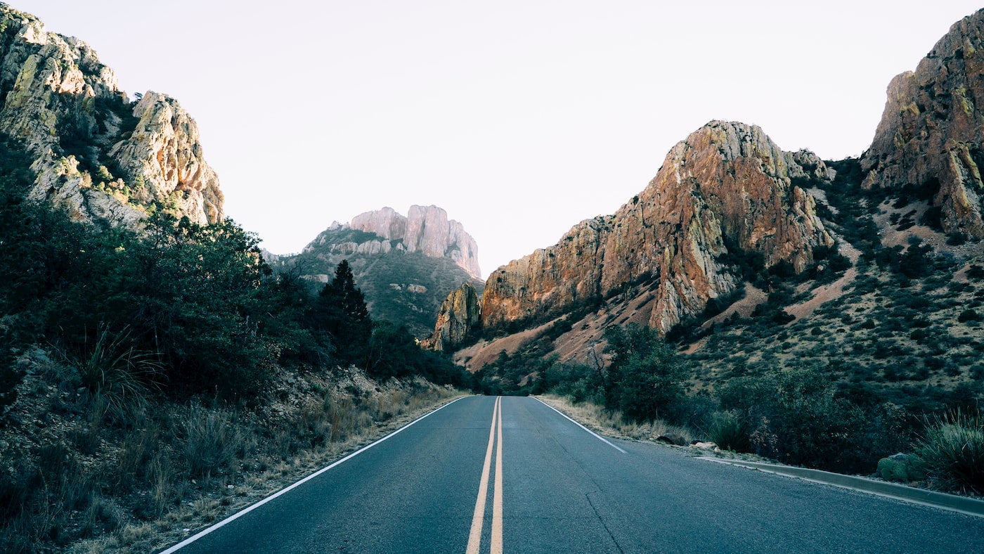 Canyons of Big Bend surrounding a road.