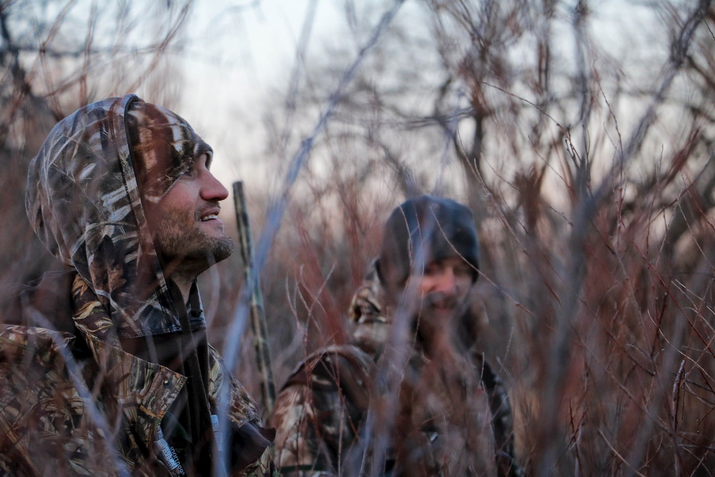 Hunters dressed in camouflage.