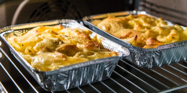 maceroni and cheese in a foil tin in the oven