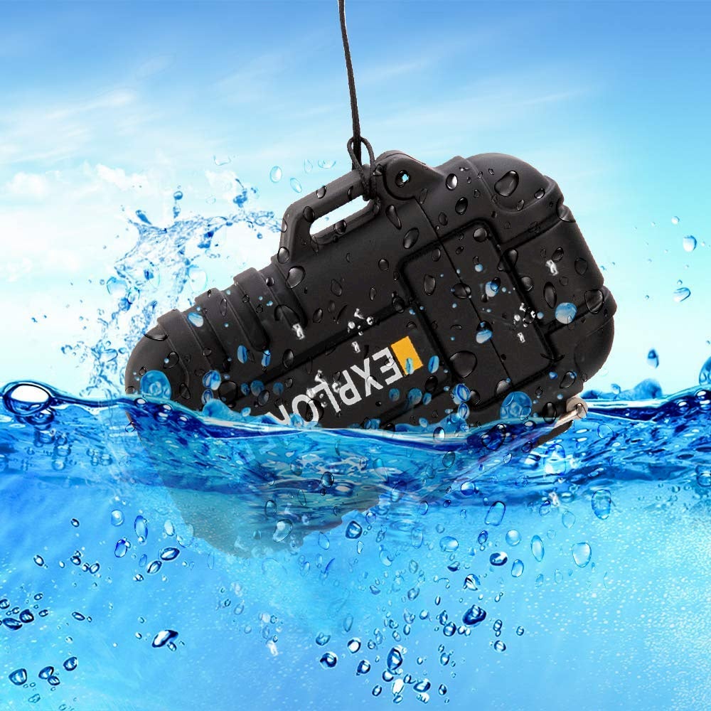 Black rugged lighter being dropped into water.