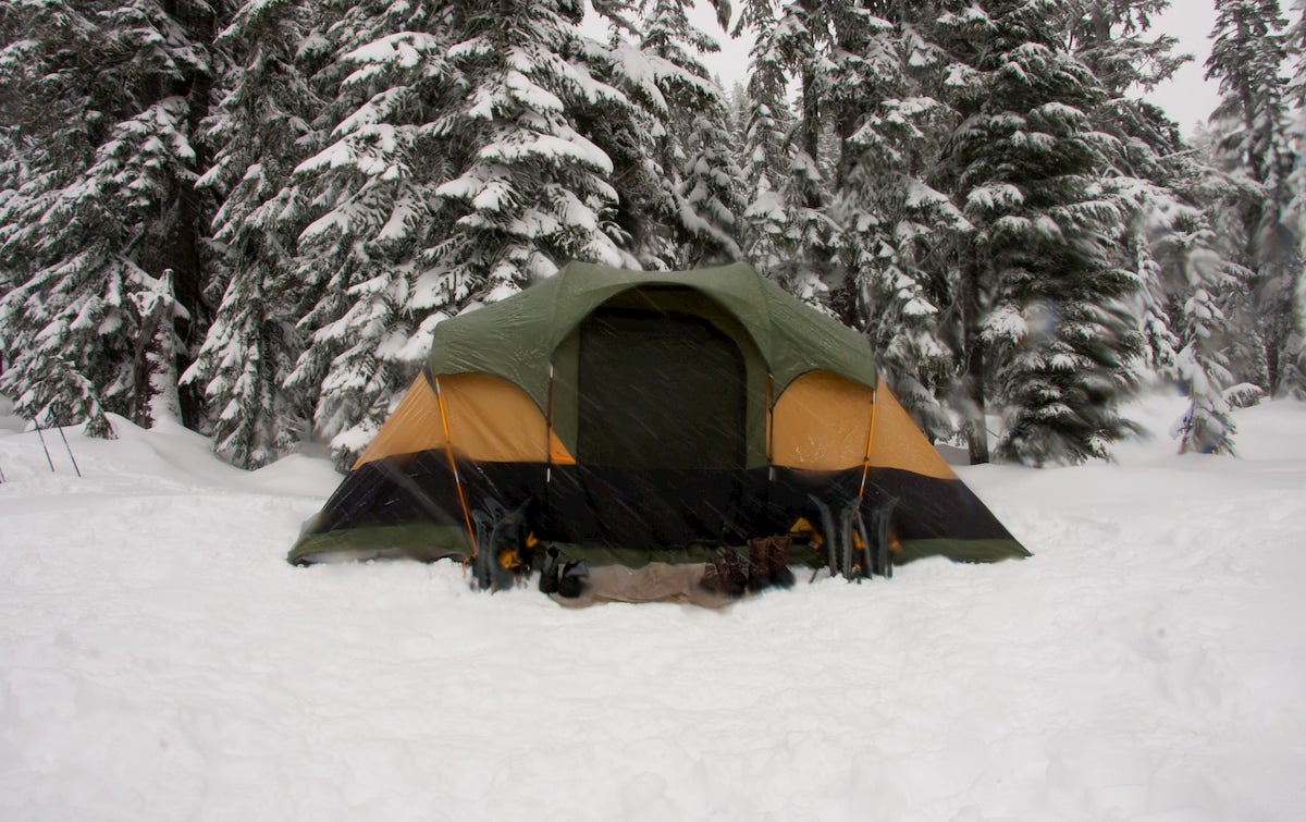 Tent in the winter pitched in snow covered landscape.