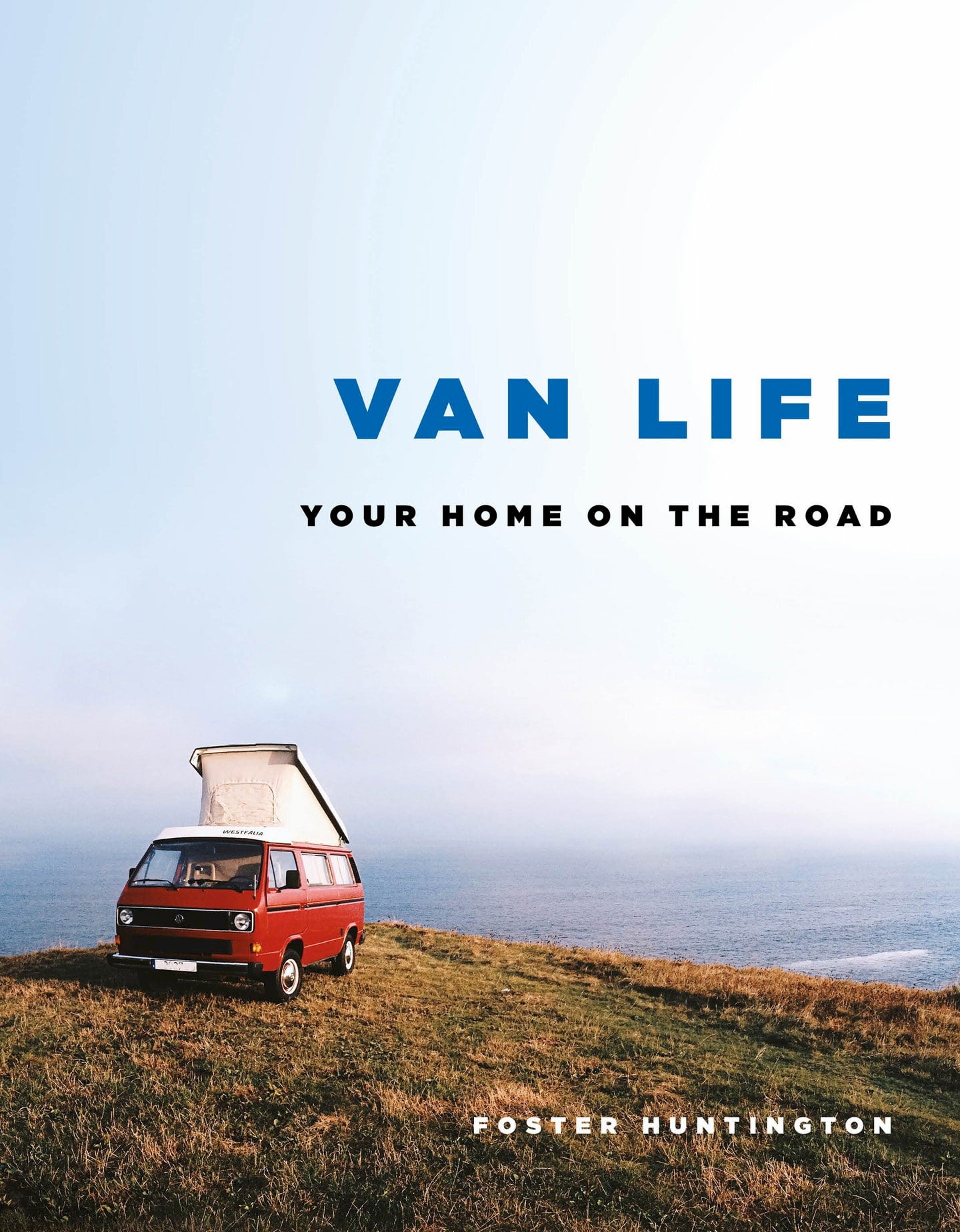 Book with red westfalia van parked beside an ocean on the cover.