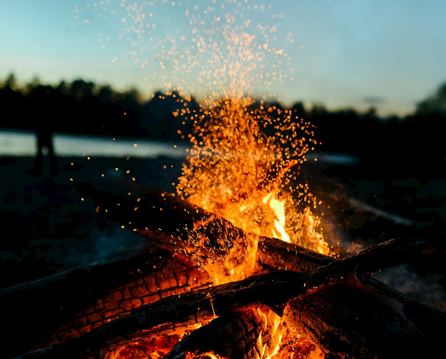 close up of sparks coming away from fire