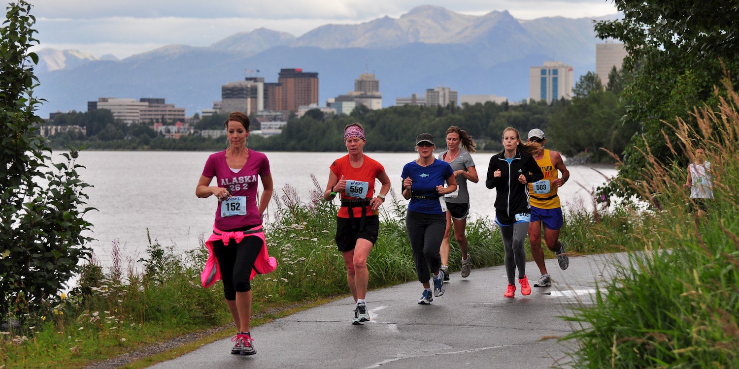 group of runners by waterfront