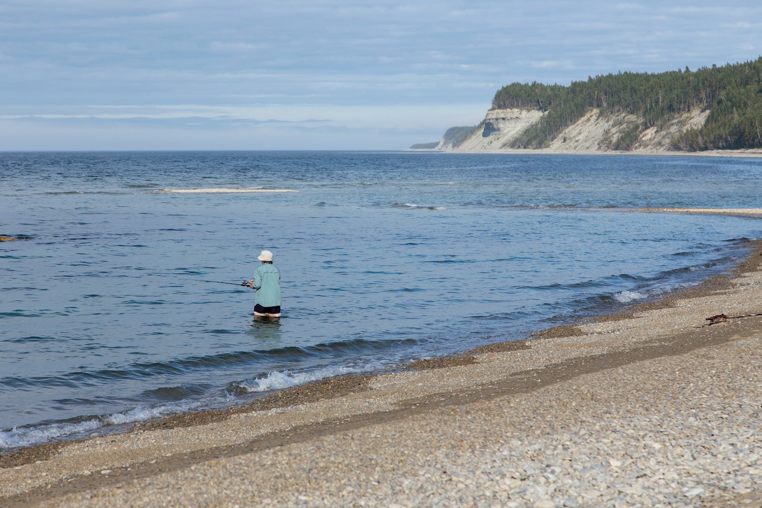 woman fishing the st lawrence river