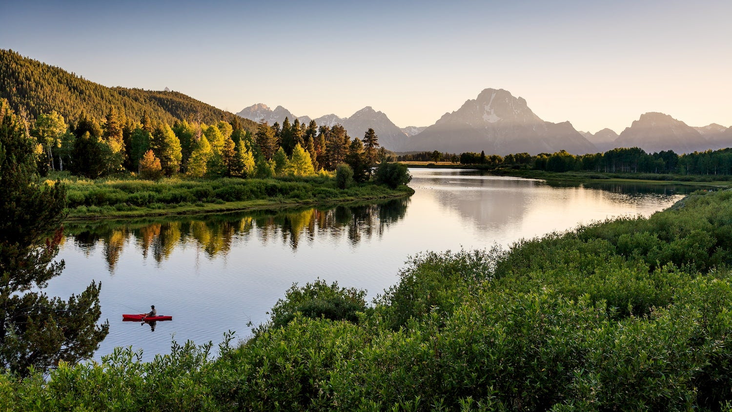 person on boat in snake river