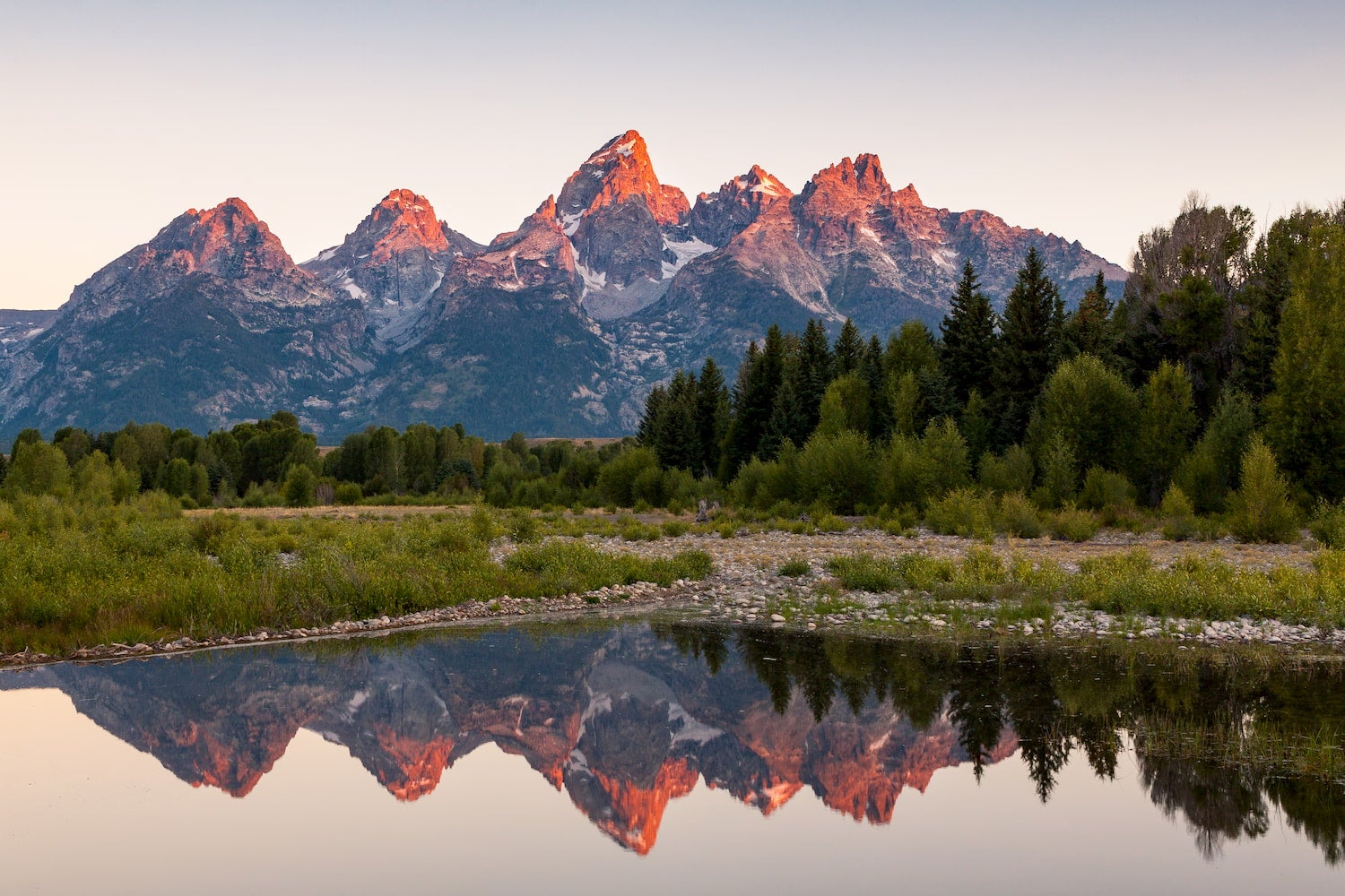 lake and Grand Teton National park at sunrise