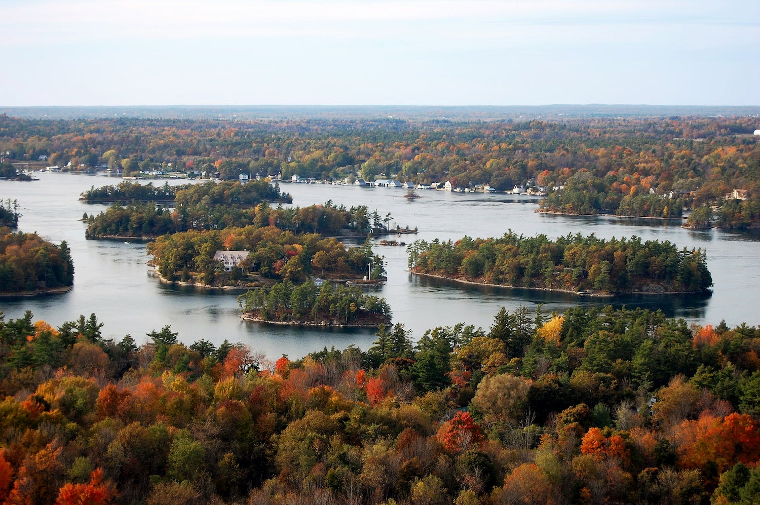 wide shot of thousand islands ny in fall