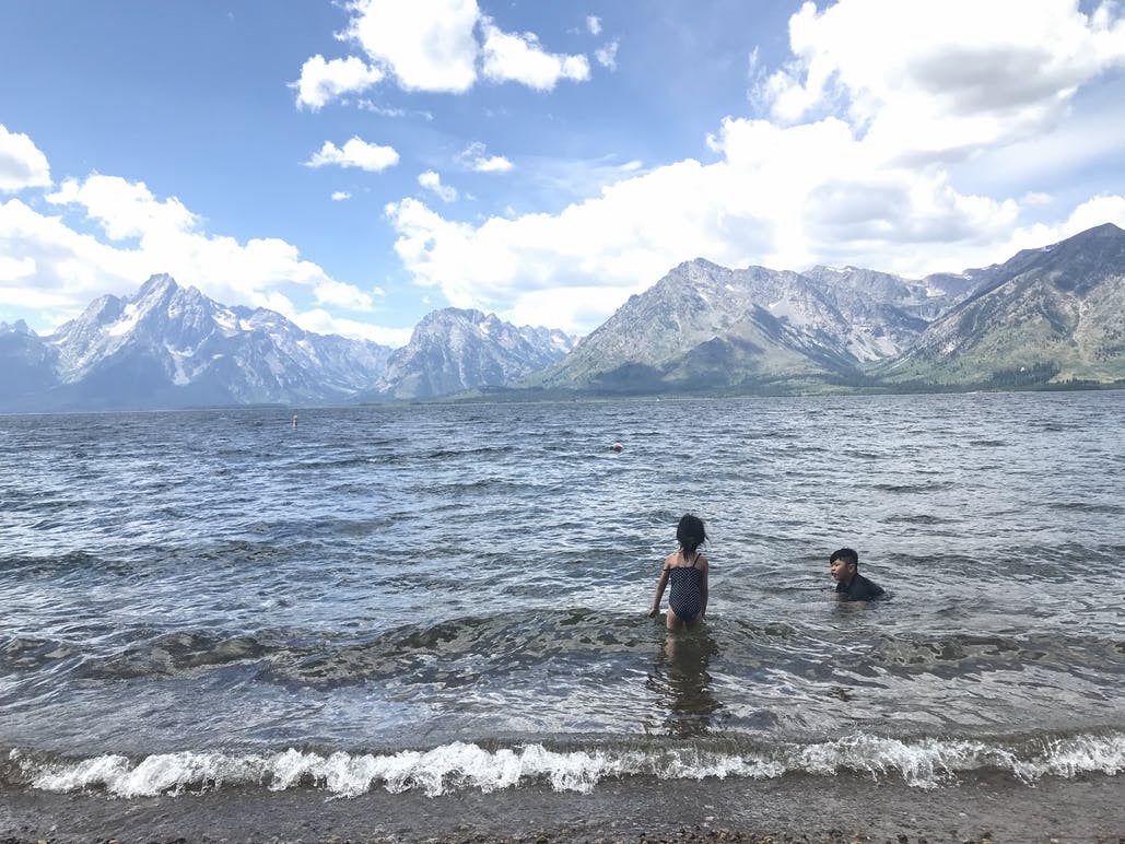kids playing in water at Grand Teton National Park