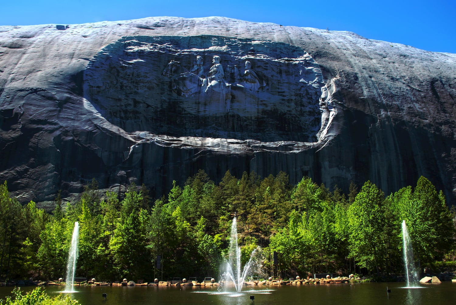 stone mountain with fountains in foreground