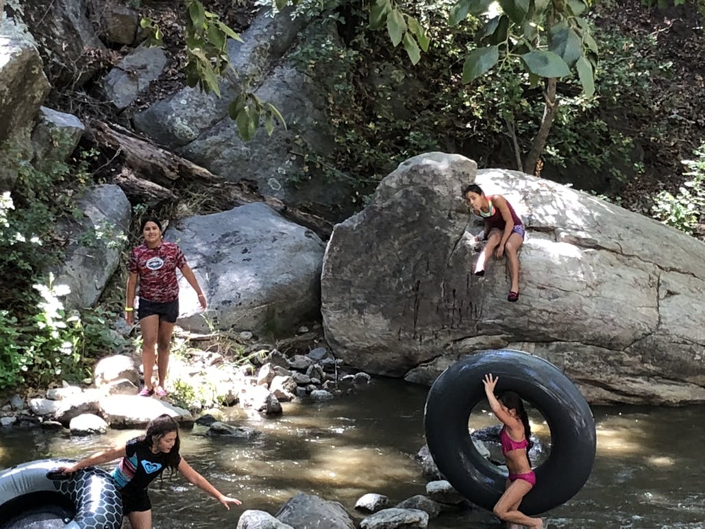 kids playing in river