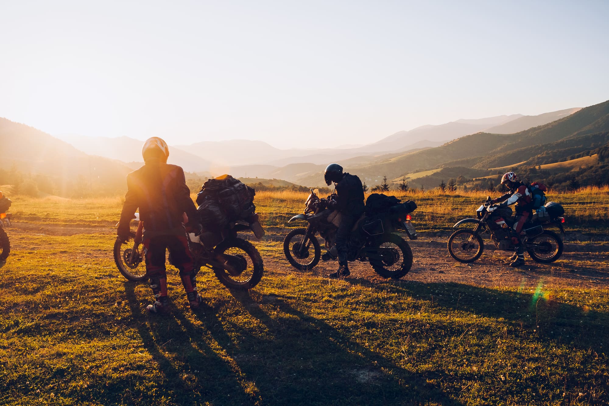 motorcycle campers at sunset