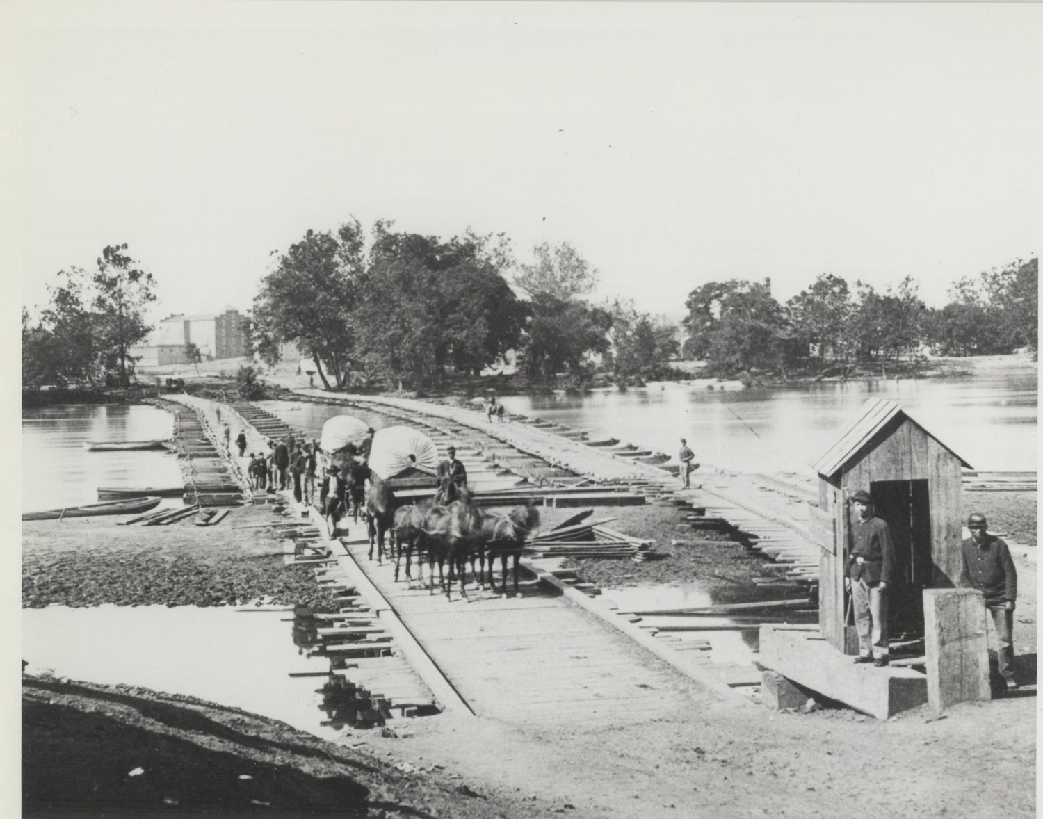 Army Corps of Engineers building a bridge during the civil war