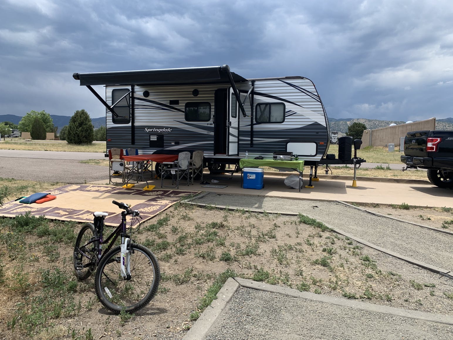 pull-behind camper parked at campground