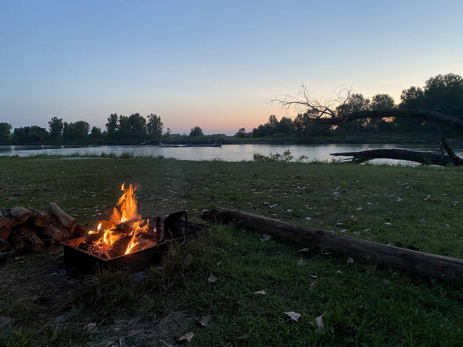 campfire on beach at sunset