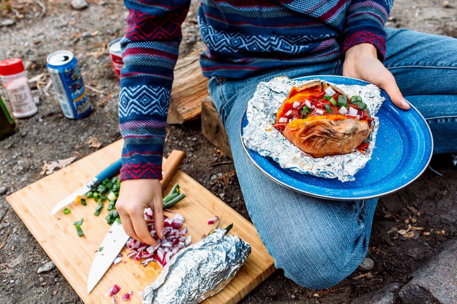 https://blog-assets.thedyrt.com/uploads/2020/10/foil-wrapped-baked-sweet-potatoes-with-chili-camping-meal-7-1.jpg