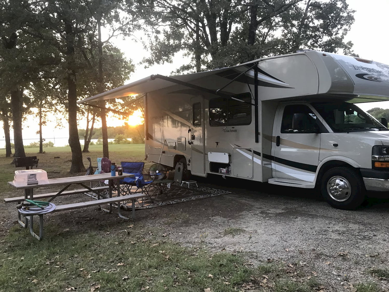rv set-up at campground at sunset