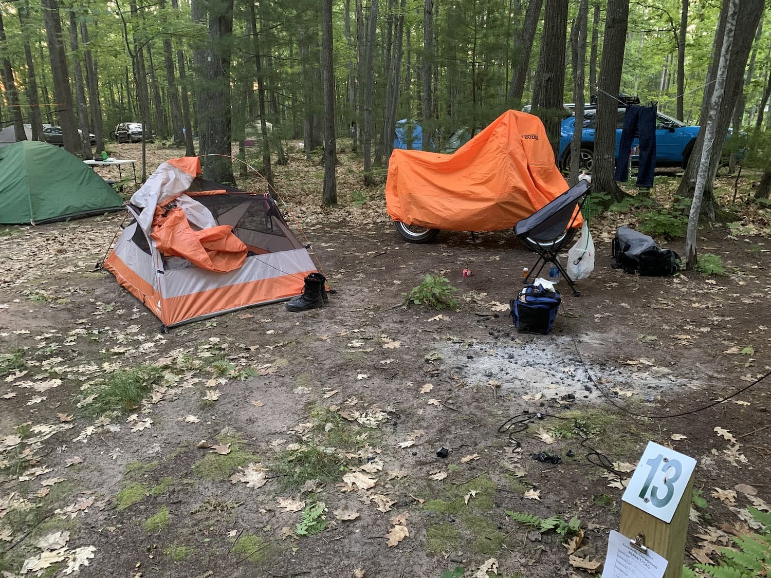 tent and motorcycle at campsite