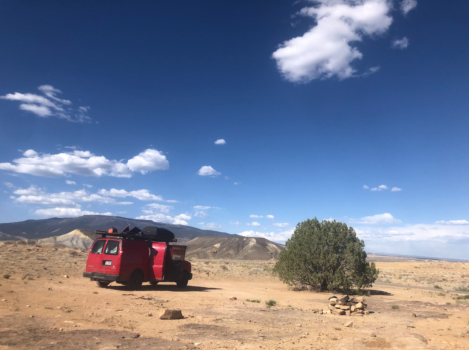 van in desert new juniper tree