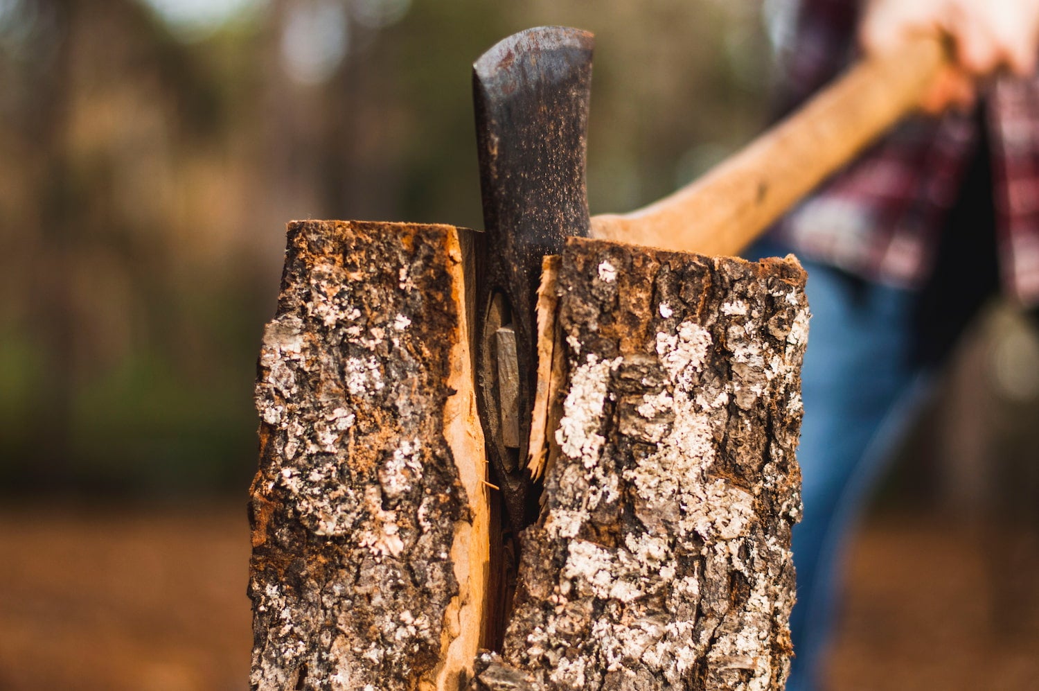 Camper chopping wood.