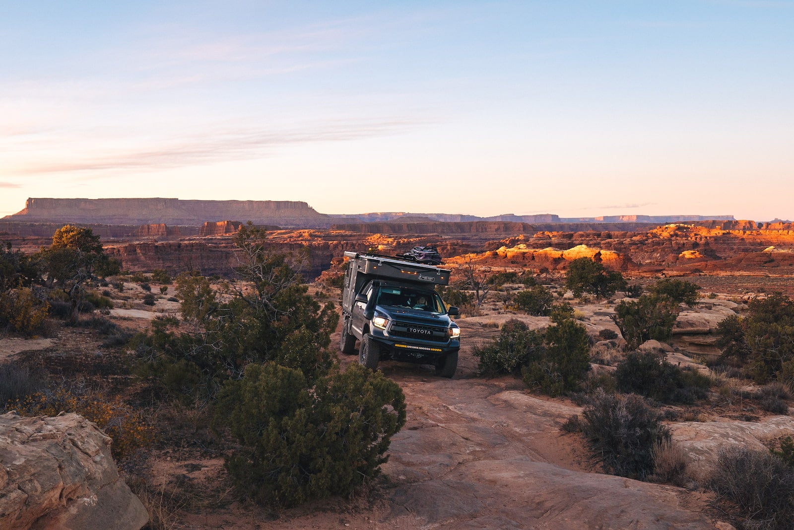 Bound for nowhere truck rig overlanding in a canyon in the southwest.