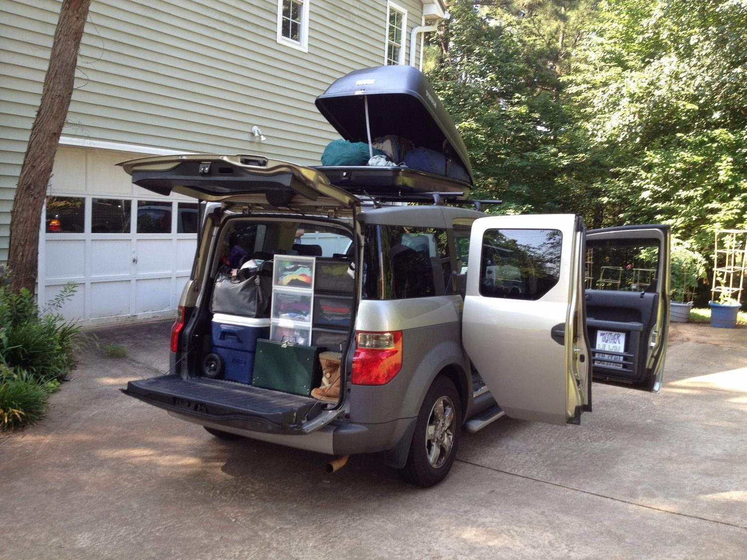 Honda Element packed to the brim with camping gear.