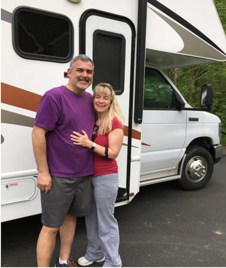 Mike and Susan with their Class C RV.