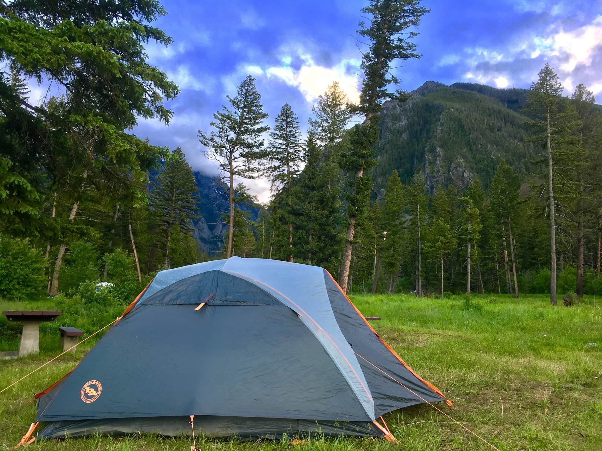 Tent in the foreground with Bozeman mountains in the background.