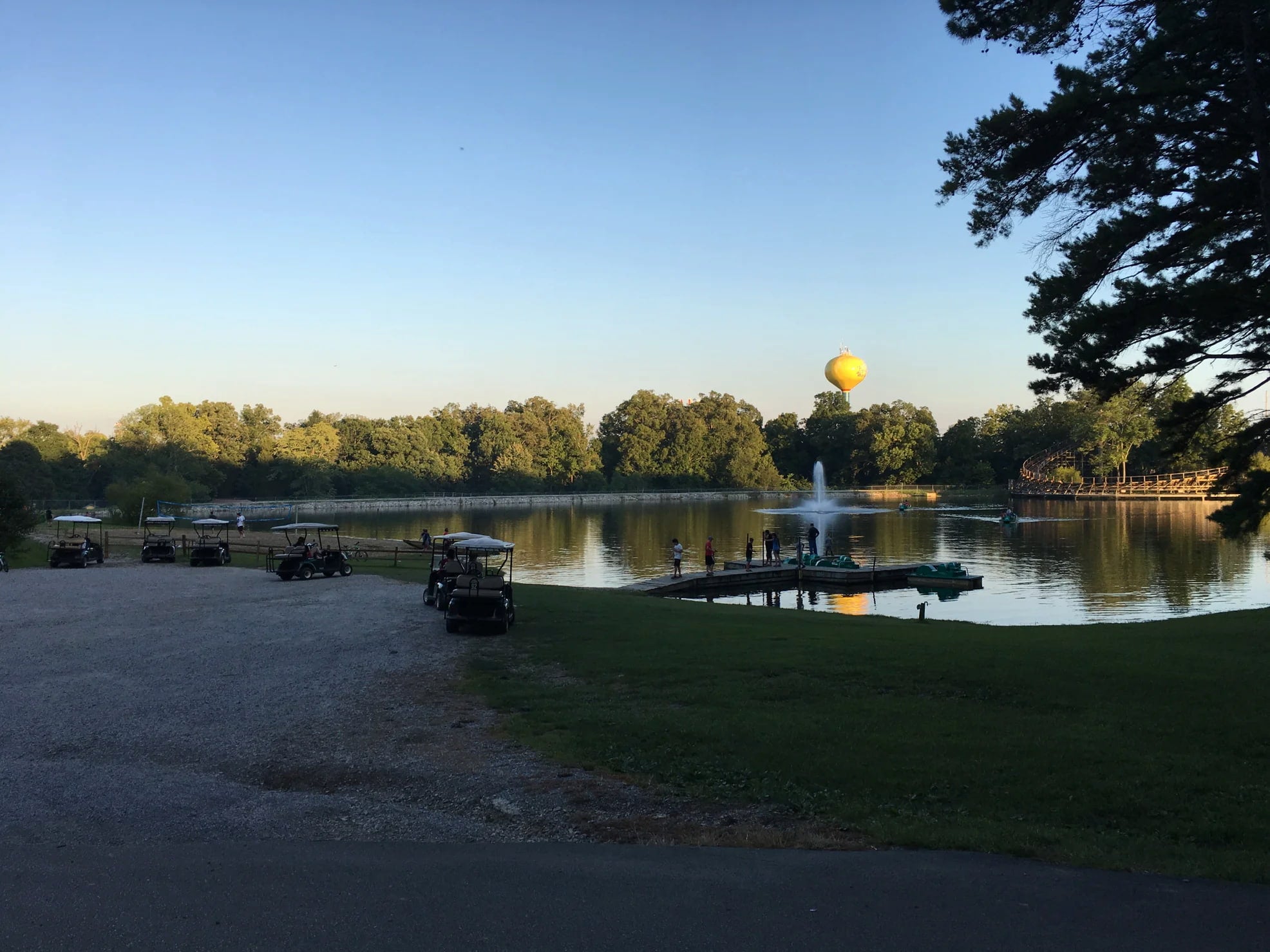 Campsite on lake with amusement park, dock, golfcarts and more.