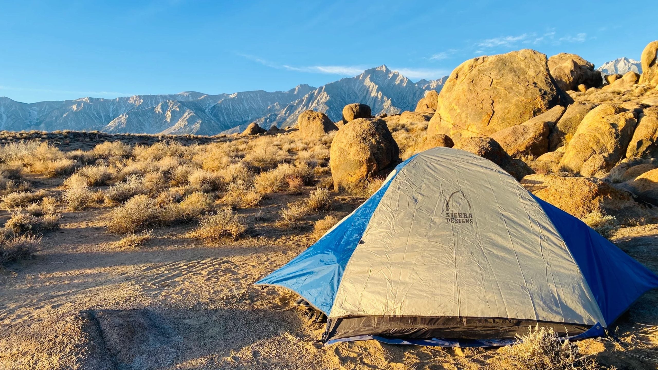 Tent campsite surrounded by mountains in Alabama Hills