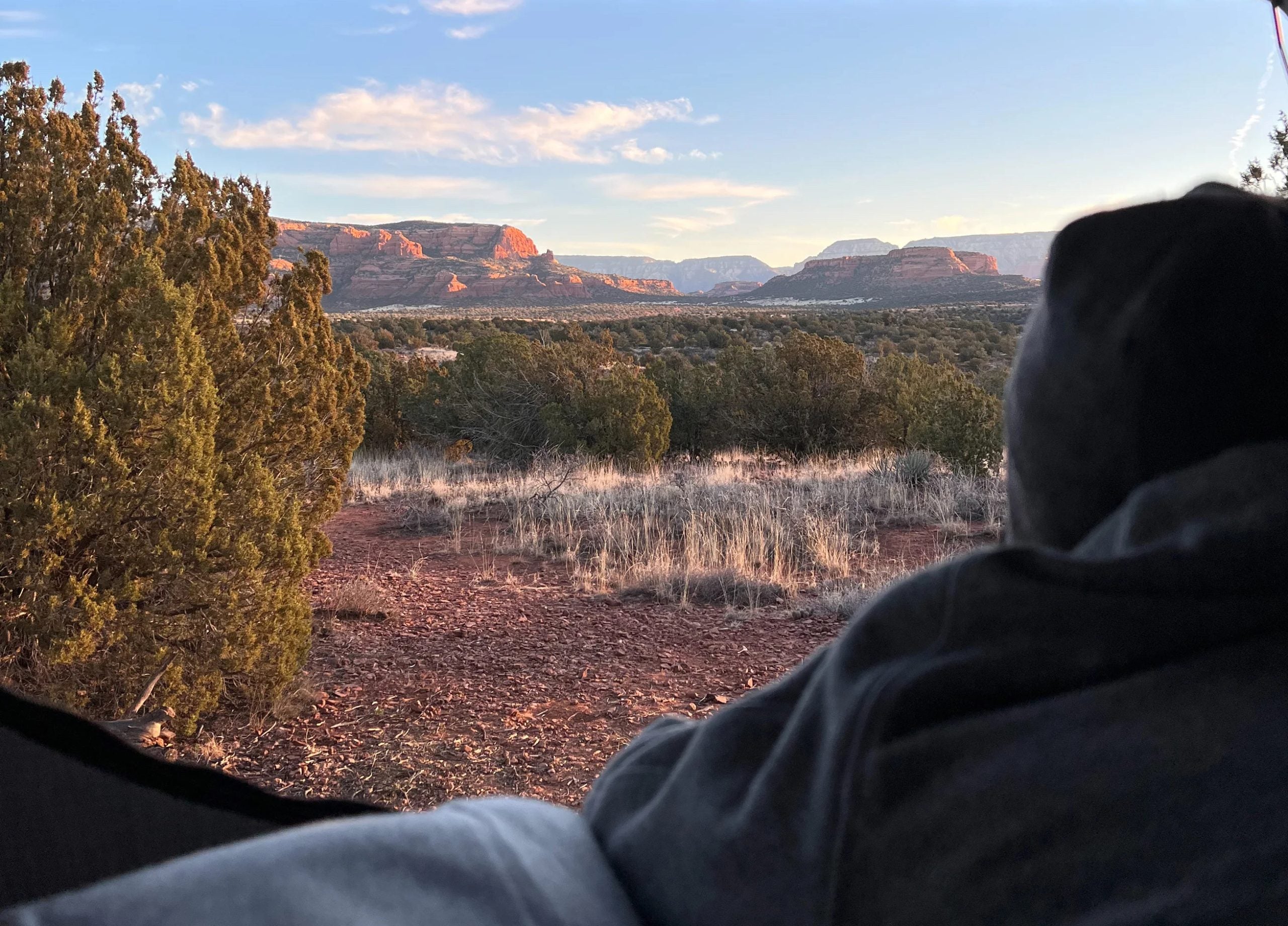 View out of a tent of the red rock formations outside of the campsite